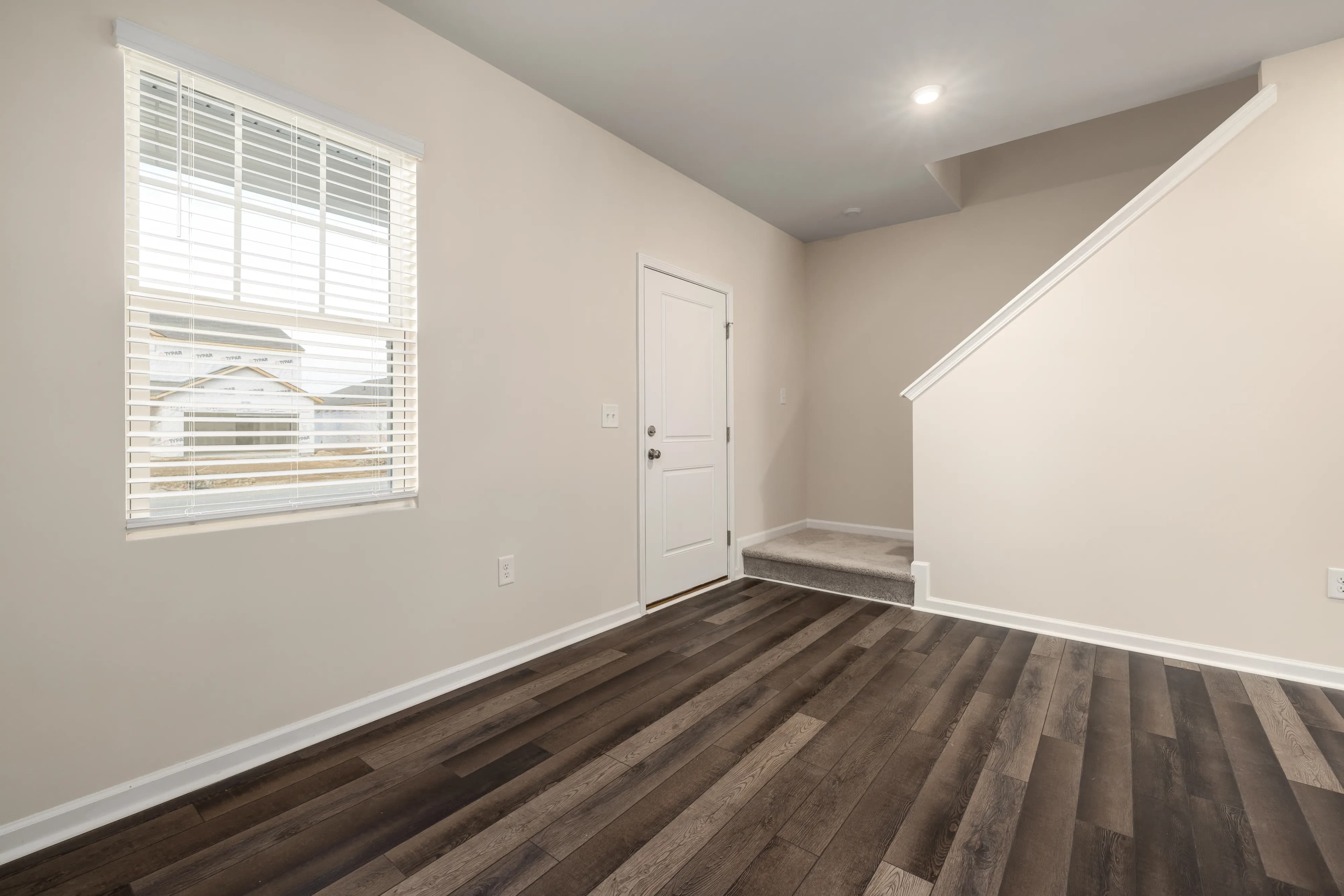 Bright coastal-style room with light timber floor